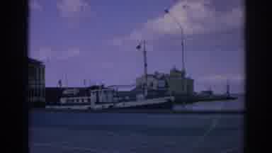 Izmir Turkey (1962): View Of White Docked Houseboat With Red Flag On A Clear Day