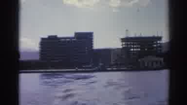 Izmir Turkey (1962): Panning Across Water On Cloudy Day With Buildings In