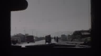 Izmir Turkey (1962): Driving Down The Street In Passing Cars And Man Pulling Cart