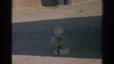 Izmir Turkey (1962): Little Kid Finds Something On The Ground