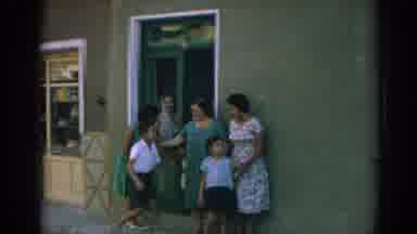 Izmir Turkey (1962): Two Turkish Ladies Pose With A Couple Of Boys As Others Watch