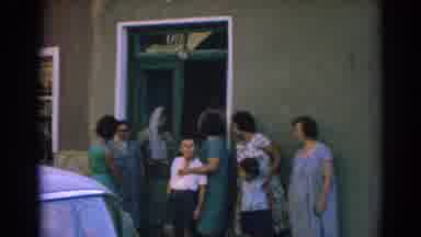 Izmir Turkey (1962): Women With Children Gather Outside Of Green Building On A