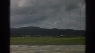 Izmir Turkey (1962): Takeoff Of An Airplane On A Gray Day And With Mountains In