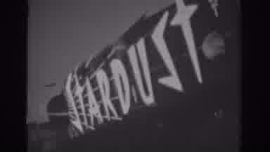 Las Vegas (1962): View Of Flashing Stardust And Pioneer Club Casino Signs On A