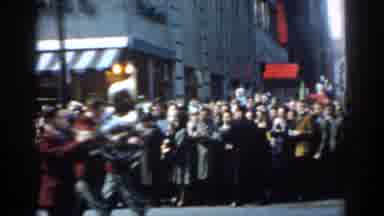 New York City (1962): A Parade In A City With A Marching Band And Flag Bearers