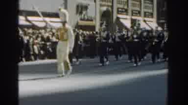 New York City (1962): Boy Wearing Green Shirt Waves To Camera On A Sunny Day