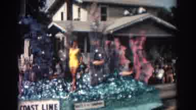 Pasadena California (1962): Waving Beauty Queen On Parade Float Driving Down Paved