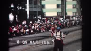 Pasadena California (1962): Woman Wearing Red Costume Drops Baton During Parade On
