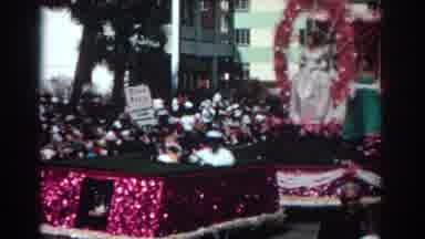 Pasadena California (1962): People In Ornate Clothes Parading In Floats A Man