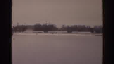 Florida USA (1963): View Of People Skating On Frozen Lake On A Clear Day