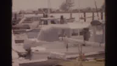 Florida USA (1963): Pier With Several Boats Of Different Sizes On A Calm Sea Day