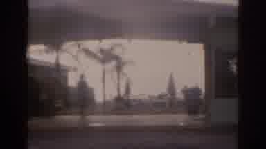 Florida USA (1963): The Camera Captures The Brown Building With Cars Parked Out