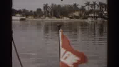 Florida USA (1963): View Of Small Red Flag Waving From Boat On A Clear Day