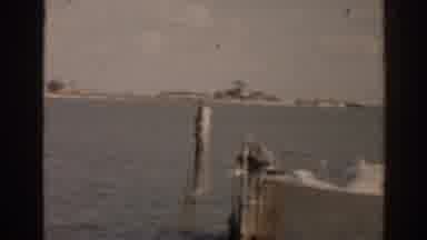 Florida USA (1963): Pier In A Town On The Coast With Boats Moored On It
