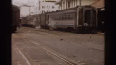 Florida USA (1963): A Clip Showing Tall Buildings Vintage Cars And Rail Trains