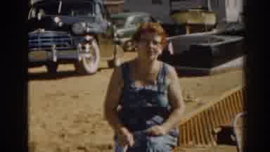 New Jersey USA (1963): Woman Wearing Straw Hat Poses With Woman Wearing Blue Dress