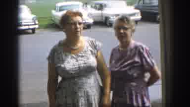New Jersey USA (1963): View Of Large Tan Tent And Two Women Standing In Front Of