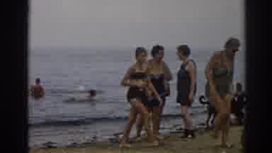 New Jersey USA (1963): People At The Beach Some Walking Some In The Water