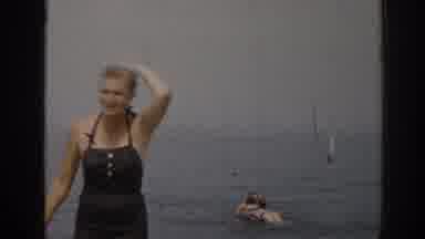 New Jersey USA (1963): Woman On The Beach In Summits Then Cuts To People In A