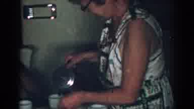 New Jersey USA (1963): A Lady Serving Breakfast To Her Husband