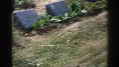 New Jersey USA (1963): Camera Sails Around A Cemetery Showing Plots And A