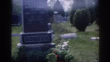 New Jersey USA (1963): A Black Car Is Shown Before The Camera Pans To A Cemetery