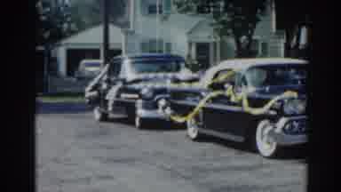 New Jersey USA (1963): Line Of Decorated And Old-Fashioned Cars In A Suburban