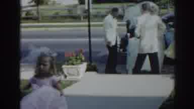 New Jersey USA (1963): Flower Girl Walks Down The Walk Way As Others Help The