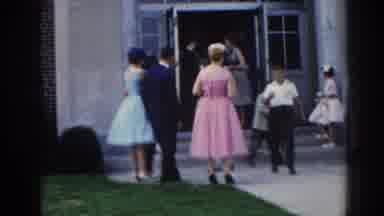 New Jersey USA (1963): Well Dressed Family Members Celebrate Graduation Of Young
