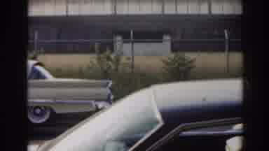New Jersey USA (1963): Three Cars Decorated With Streamers Drive Past Camera On A