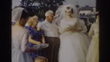 New Jersey USA (1963): People Gathering To Celebrate A Wedding Near A Busy Street