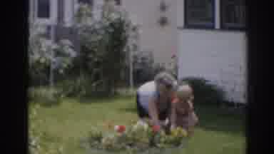 New Jersey USA (1963): Grandmother Teaching How To Garden With Granddaughter