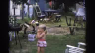 New Jersey USA (1963): An Old Film Showing A Man Getting Barbecue And A Children