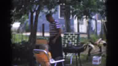 New Jersey USA (1963): Family Good weather Barbecue Child Whiling Playing Car
