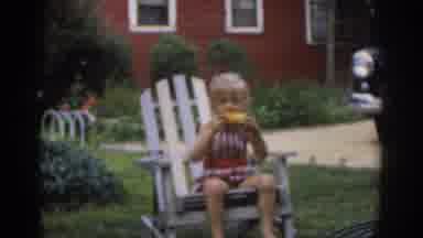 New Jersey USA (1963): A Girl Sitting In The White Chair And Eating Corn