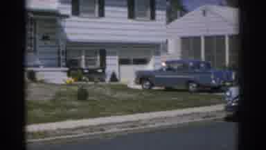 New Jersey USA (1963): Blue Cars Parked At The Front Of A Suburban Home