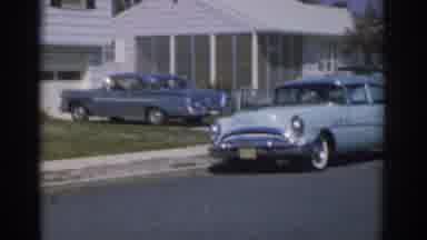 New Jersey USA (1963): A Suburban Setting With Three Different Cars Parked In