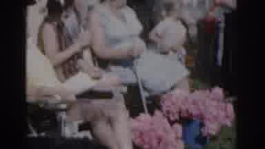 New Jersey USA (1963): Two Pots Of Pink Flowers Resting At Feet Of Women Sitting