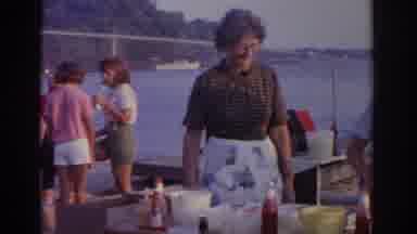 New Jersey USA (1963): Two Elder Women Stand And Talk To Each other As A Young Man