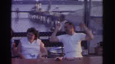 New Jersey USA (1963): Men And Women Sitting On A Pier On A Sunny Day Waiting For