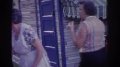 New Jersey USA (1963): Women Cook Outside On The Grill As Another Takes A Taste