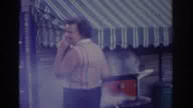 New Jersey USA (1963): Lady Dancing Near A Lit Barbecue Grill
