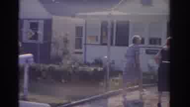 New Jersey USA (1963): Three Women Walking Up A Driveway In The Suburbs On A Sunny