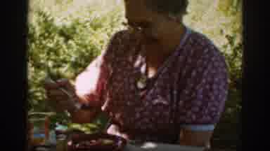 Auburn California (1939): Older Lady Smiling While Enjoying A Day Out With Family