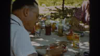 Auburn California (1939): Picnic Outside Enjoying Food And Company