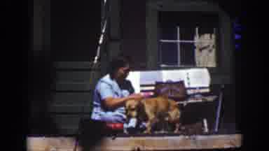 Lake Tahoe California (1939): Lady Washing The Dog On A Sunny Afternoon Outside