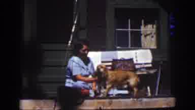 She's not just washing the pup, but its reputation too!