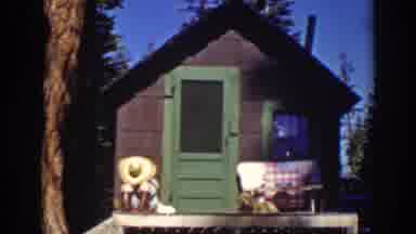 Lake Tahoe California (1939): Taking A Nap In Front Of A Hut With Nature Around