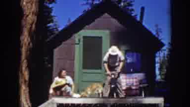 Lake Tahoe California (1939): A Couple Sitting In Their Balcony Smoking And