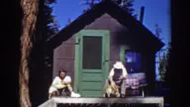 Lake Tahoe California (1939): Couple Sitting Petting And Playing With Their Dog In